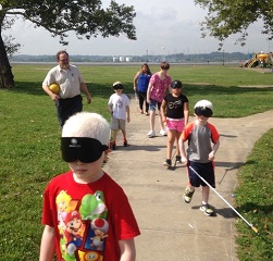 Bell buddies practicing cane skills