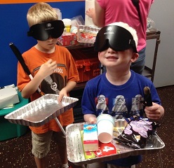 Luke and Nate practicing walking with trays